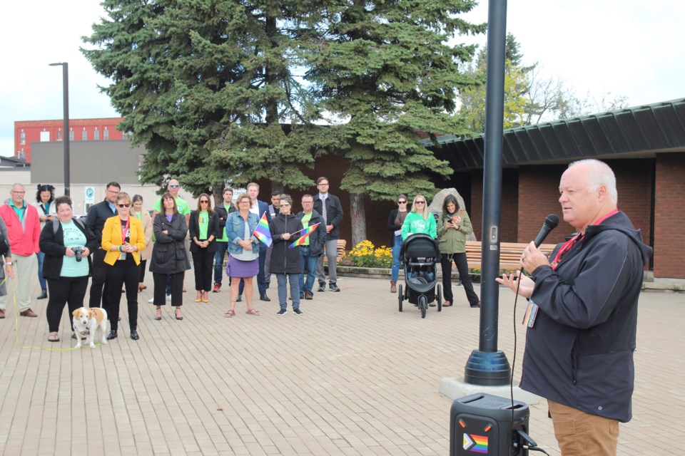 Jason Maclennan of North Bay Pride gives a speech before the flag was hoisted