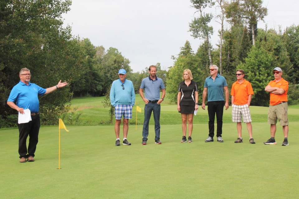 (From left) Jeff Rogerson, Managing Director at Osprey Links, former Premiere Mike Harris, club president Brad Minogue,  Tammy Morison, President & CEO NBRHC Foundation, Paul Heinrich, President & CEO, NBRHC, and Sylvain Cote and Shawn Flindall of One Life Wealth Management. 