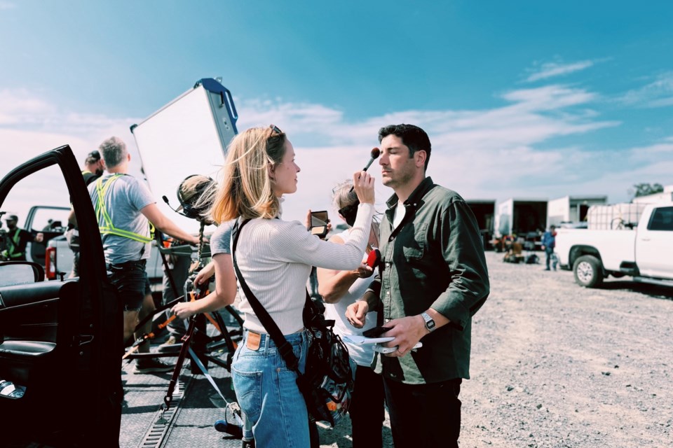 Scotia Boyd on set in Sudbury, touching up actor Jason Biggs before a scene for the film Getaway