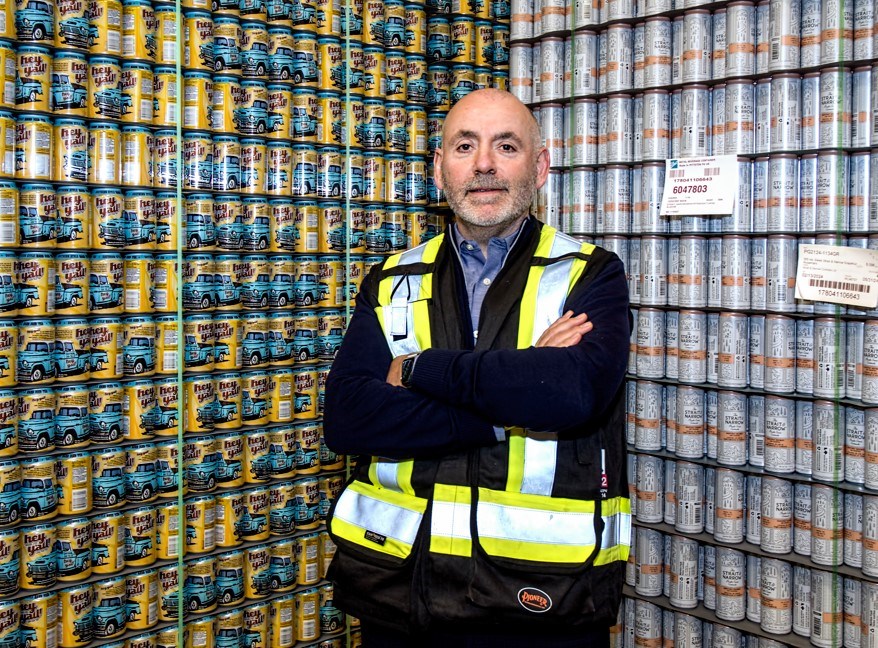 darryll-frost-in-front-of-cans-cc