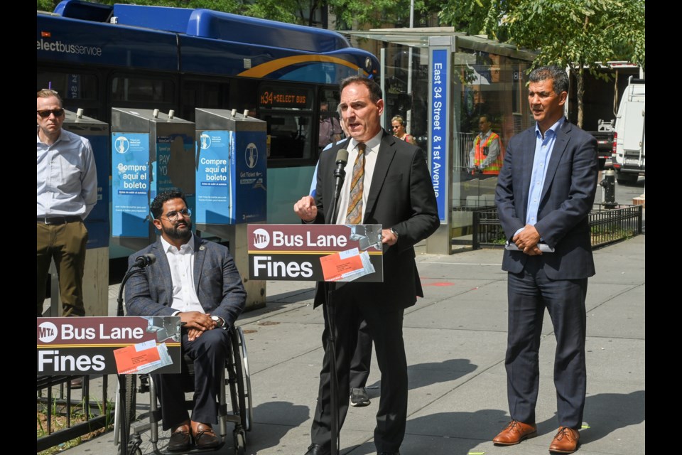 MTA New York City Transit Senior Vice President of Buses Frank Annicaro, NYC DOT Commissioner Ydanis Rodriguez, and MTA Chief Accessibility Officer Quemuel Arroyo hold a press conference on East 34th St. and 1st Av. on Thursday, Aug 15, 2024 to announce that Automated Camera Enforcement (ACE) aboard buses will start issuing fines to drivers who impede bus flow.