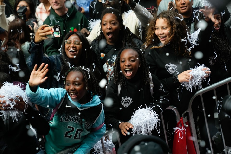 Liberty fans at the ticker tape parade in Manhattan on Oct. 24, 2024.