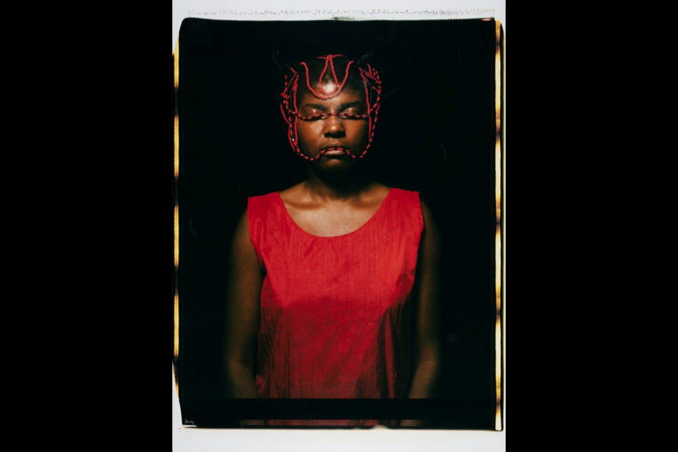 María Magdalena Campos-Pons (born Matanzas, Cuba, 1959). Red Composition(detail), from the series Los Caminos (The Path), 1997. Triptych of Polaroid Polacolor Pro photographs, framed: approx. 37 × 29 in. (94 × 73.7 cm) each; approx. 37 × 87 in. (94 × 221 cm) overall.Collection of Wendi Norris. © María Magdalena Campos-Pons. 
