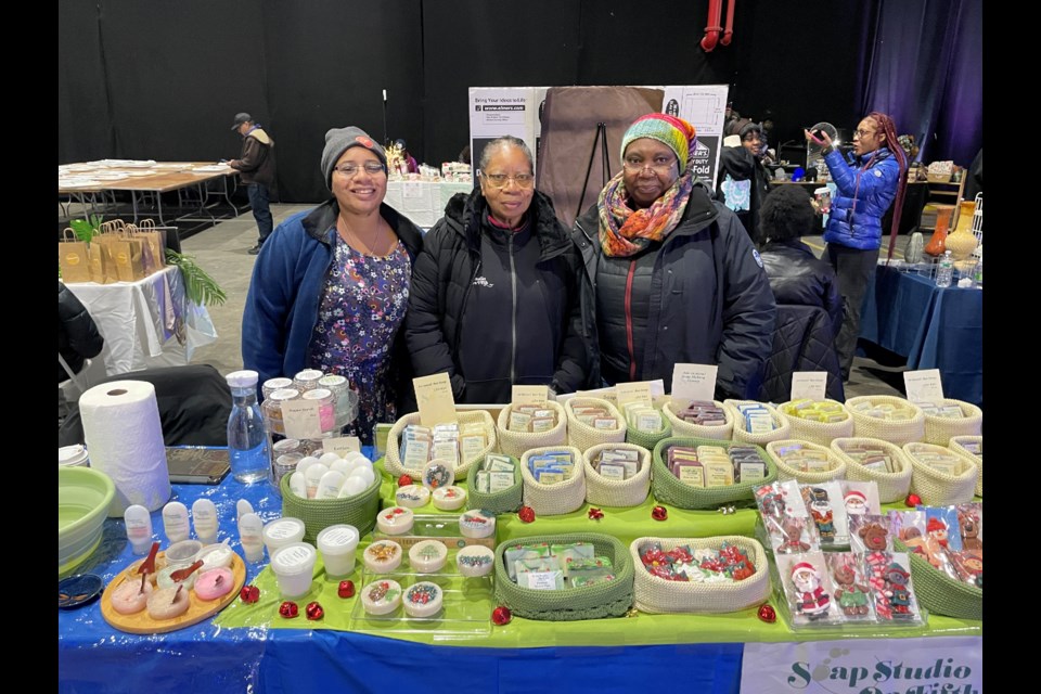 The team behind Soap on Fifth at the Wallabout Wonderland Holiday Market on Dec. 7, 2024.