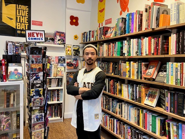 Andrew Colarusso, owner of Taylor & Co. Books, in his store. 