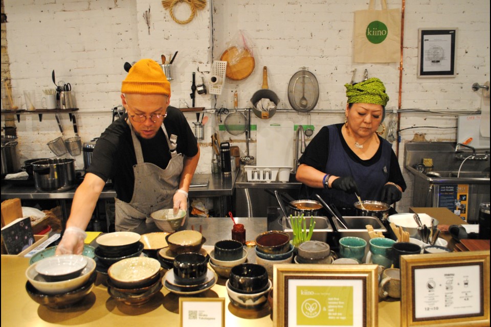 Taisan Tanaka, left, and Ayane Sakamoto, right, at the Kiino counter.