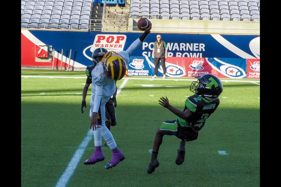 Ron Rollock, a player on the 9U Mo Better Jaguars based in Brownsville, Brooklyn, helped the team to a 13-7 victory over the Titletown Titans of Georgia to win the Pop Warner National Championship on Dec. 13, 2024.