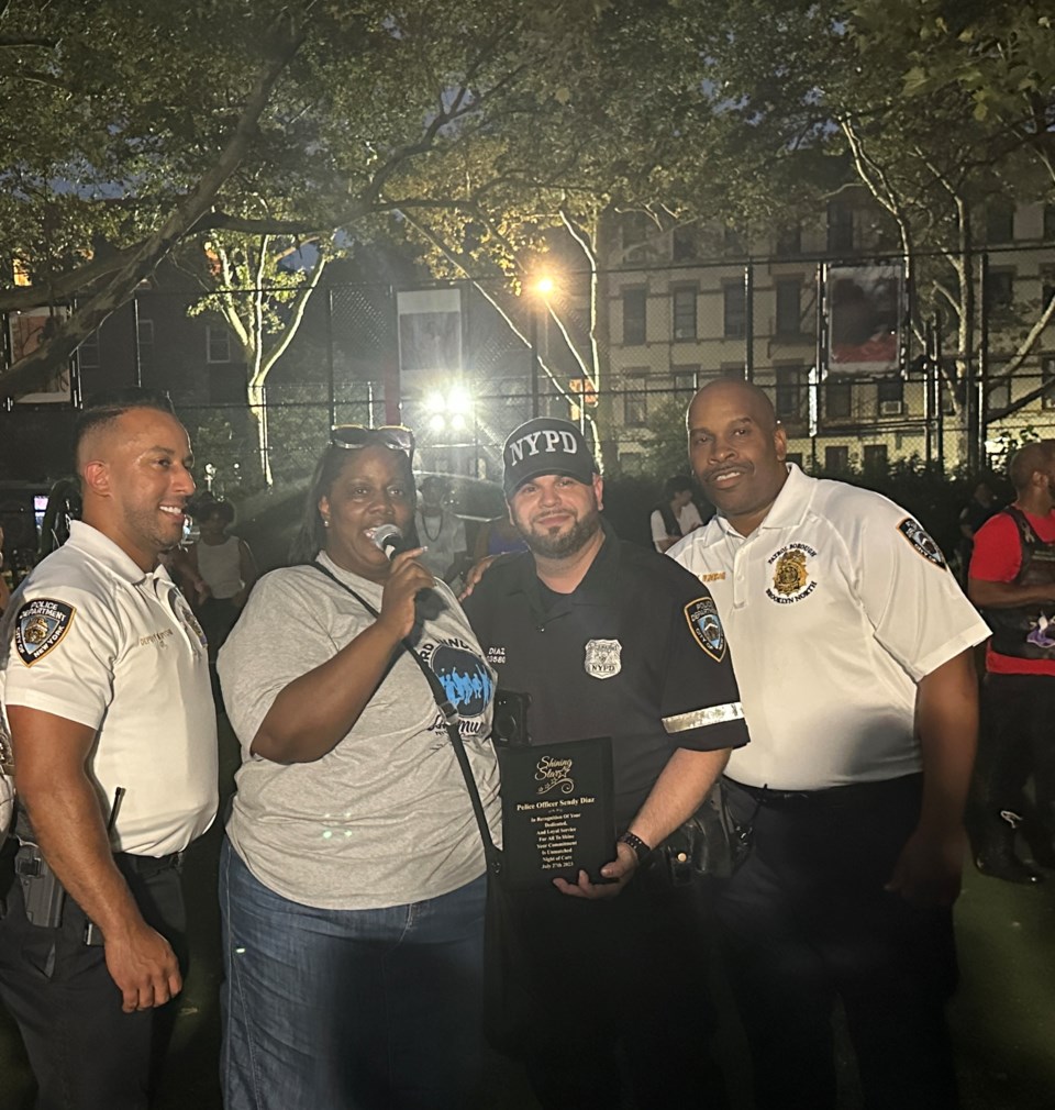 officer-diaz-was-gifted-a-plaque-for-dedication-to-the-neighborhood-l-r-inspector-gil-sharmaine-byrd-officer-diaz-deputy-chief-scott-henderson