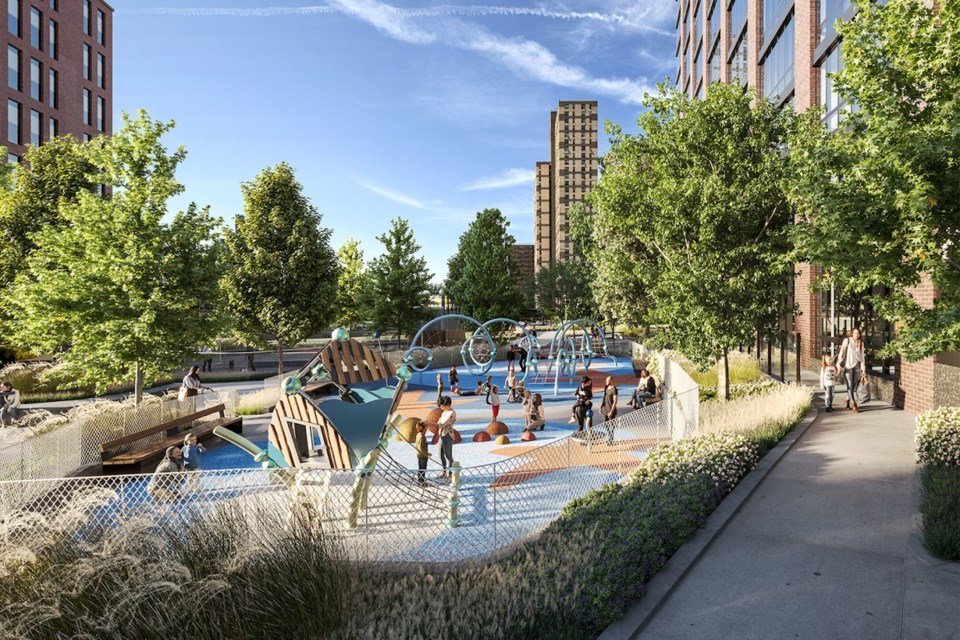 The new dog park sits next to the development's playground near the west tower. 