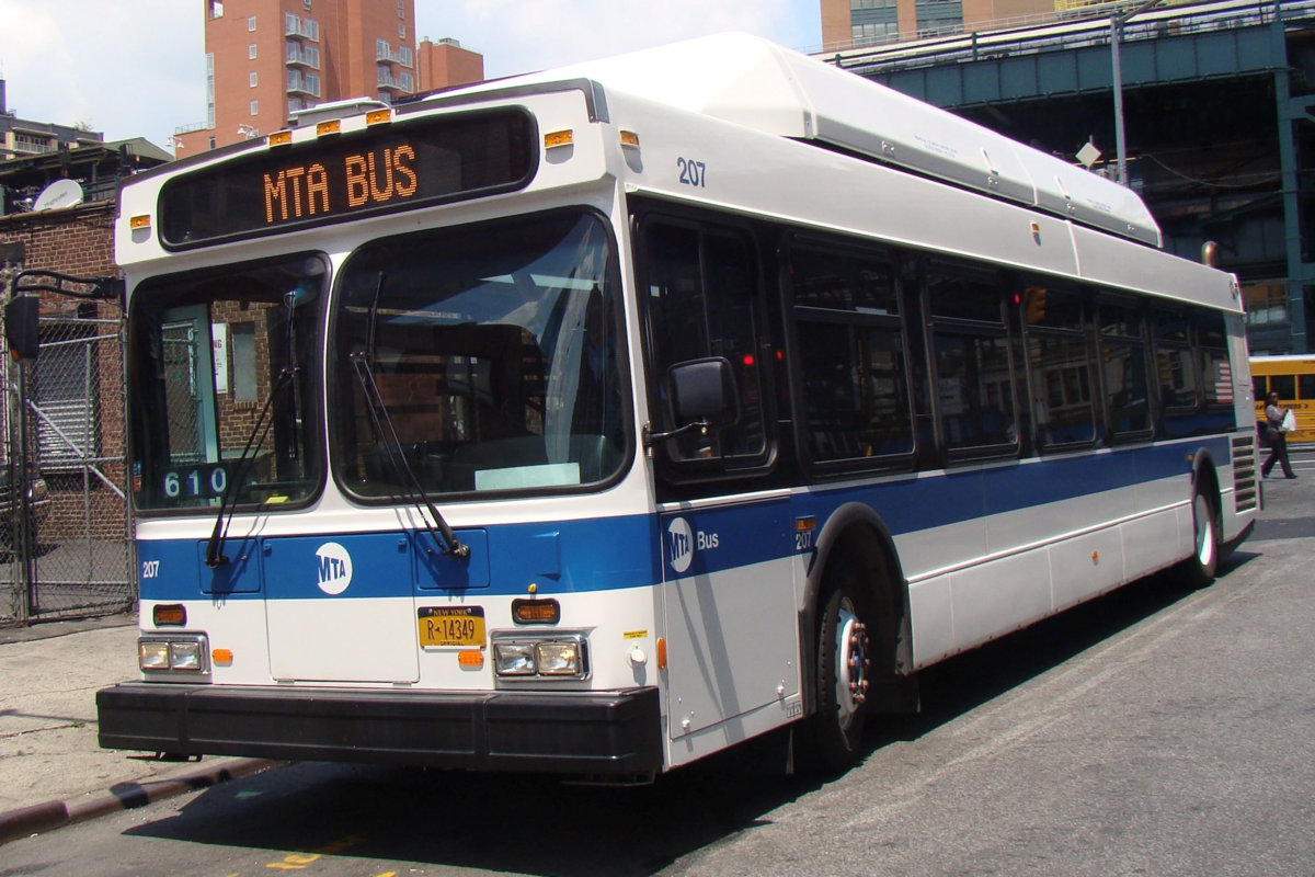 Several cars struck by MTA bus, stacked on top of each other in