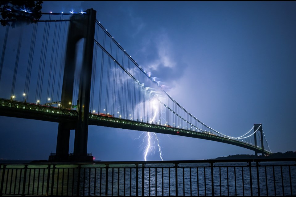 Lightning around the Verrazzano-Narrows Bridge during storm on the evening of Aug. 4, 2022, seen from Brooklyn.

(Marc A. Hermann / MTA)