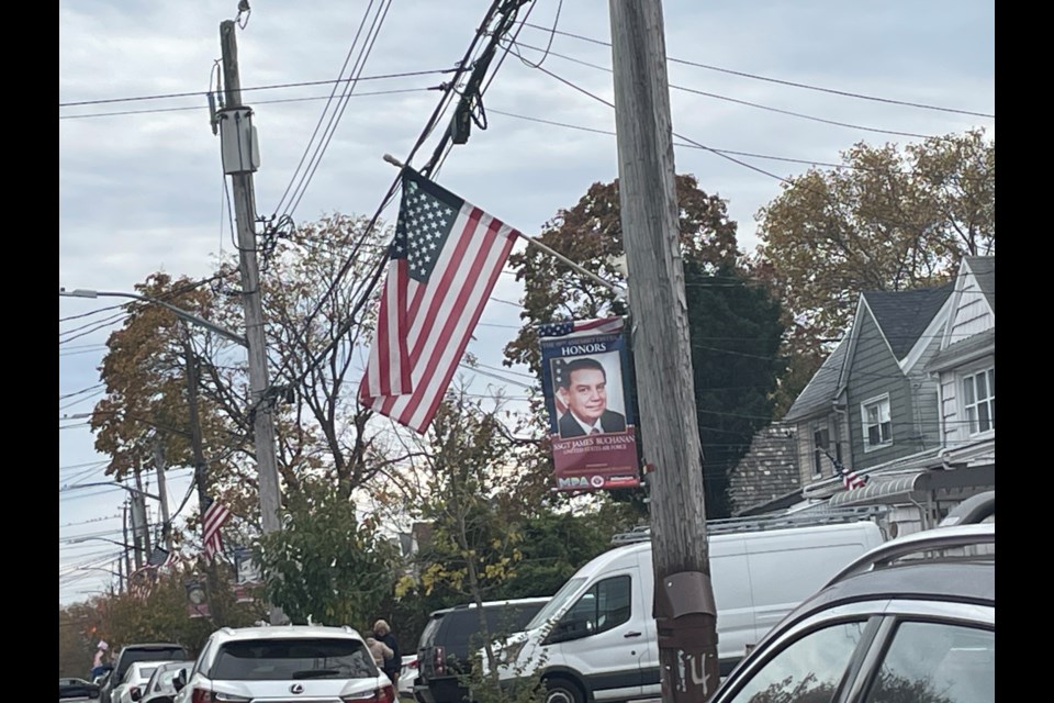 Banners of the district's veterans, living and deceased, dot streets in AD-59