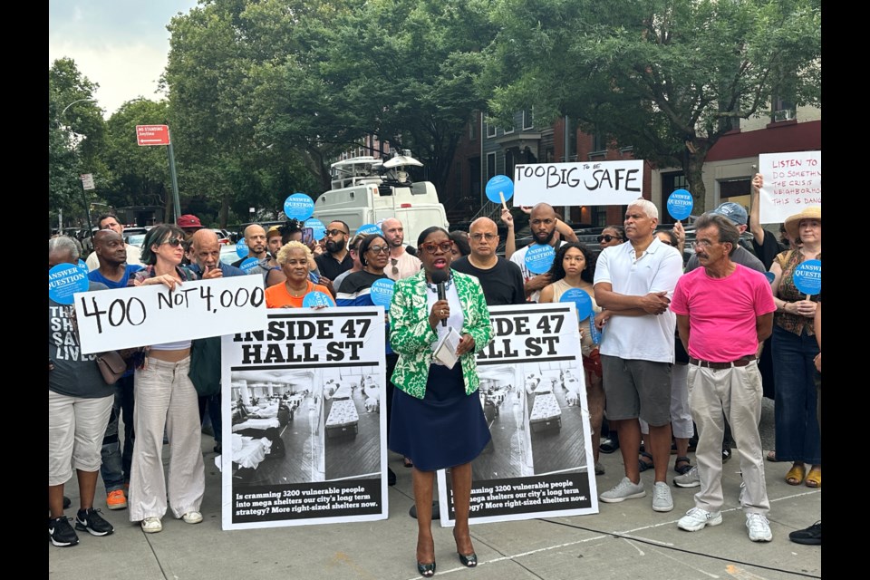 Renee Collymore, the Democratic liaison for the 57th Assembly District, organized a resident rally on Tuesday, July 23, following two shootings in Steuben Park and 29 Ryerson Street, a migrant shelter in Clinton Hill.