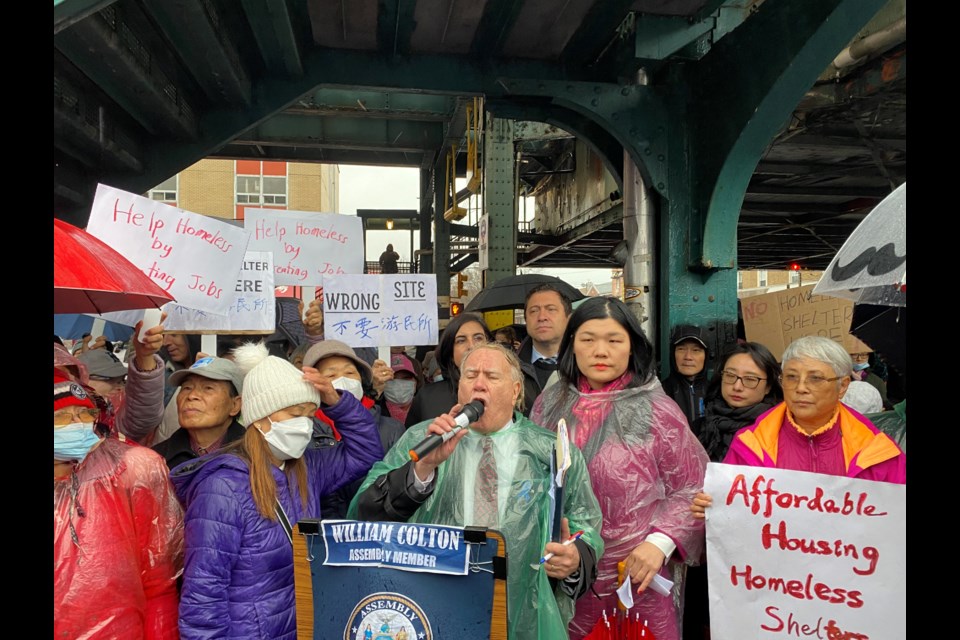 Assemblyman William Colton and Councilmember-elect Susan Zhuang organized the rally at the site of a proposed homeless shelter.
