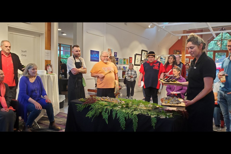 Chefs Erik Miller (left) & Jody Peck (right) joined Simon Daniel James (orange shirt) to discuss the different dishes of the Indigenous Feast. The culinary works tended not to last long after being presented to the guests.