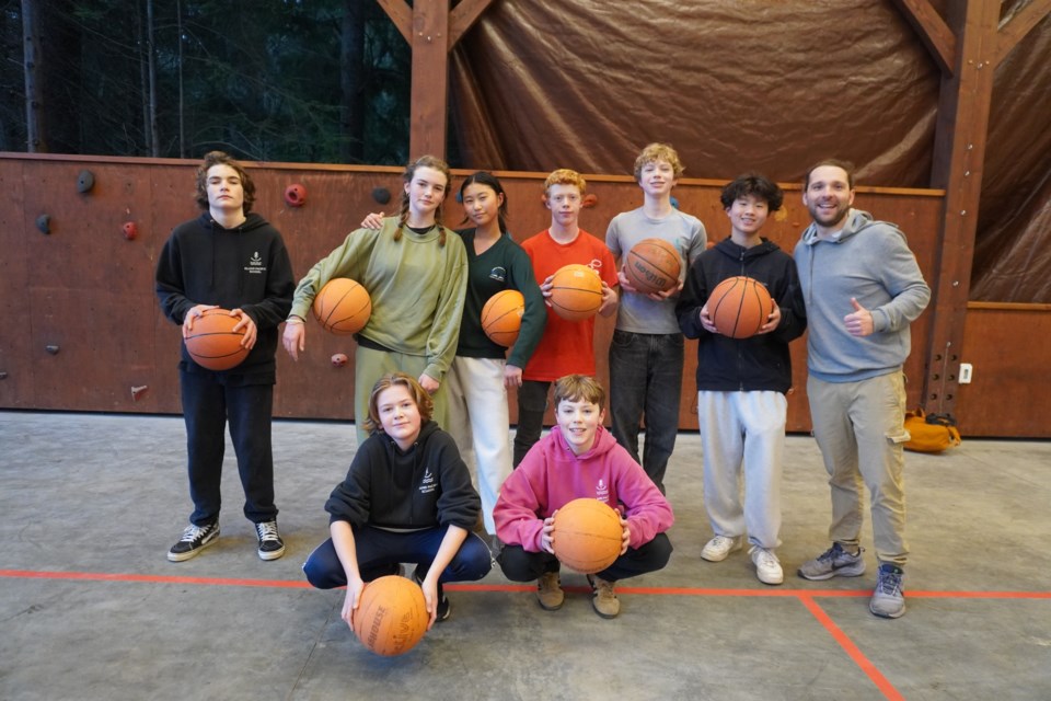 The Island Pacific School basketball team is set to wrap up a successful
season - the school’s first ever on the court - under the guidance of coach Dylan Gromen (right).