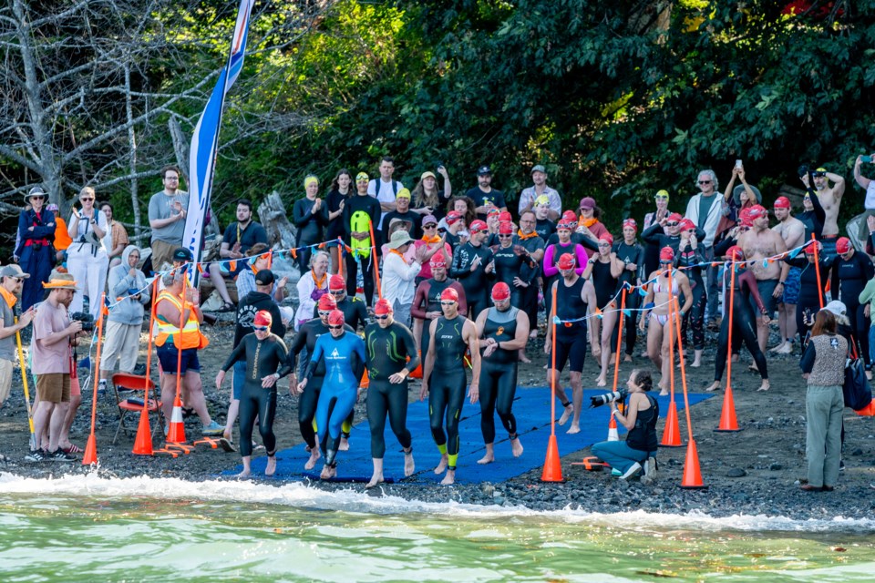 Dozens of swimmers rushed into the waters of Tunstall Bay on Saturday morning to take part in the annual SwimBowen fundraiser for the Cancer Care Fund. Participants swam either a 750 or 1,500 metre course, returning to the beach afterward to celebrate with friends and family.