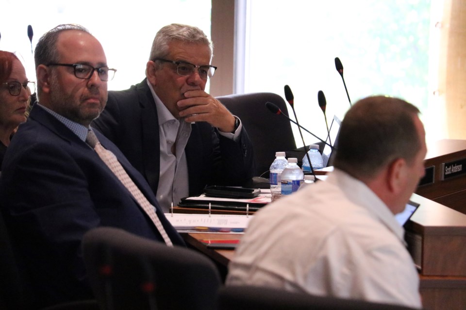 From left: Jackie White campaign CFO, Michael Binetti lawyer, and Bradford Mayor James Leduc listen as Mauro Di Giovanni speaks during the Joint Compliance Audit Committee meeting at the Simcoe County Administration Centre, in Midhurst, on Thursday morning, June 29.