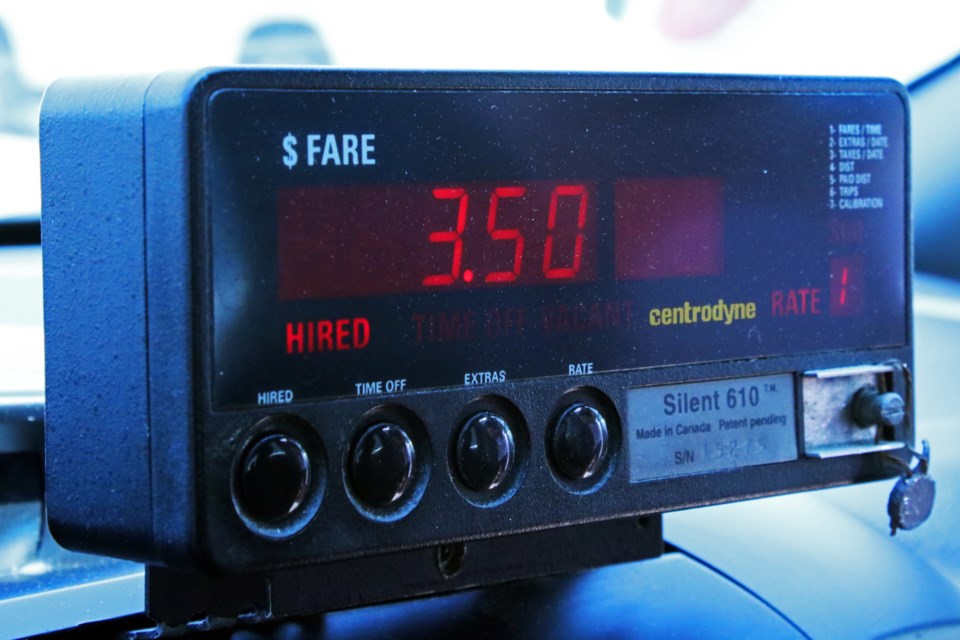 The meter displays the base rate of $3.50 in a taxi in Bradford on Tuesday, June 20, 2023.