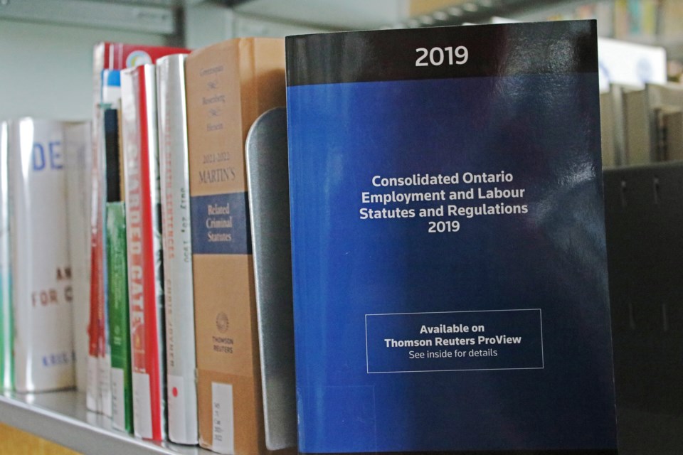 On Tuesday morning, the Ontario Ministry of Labour issued a “no-board” notice over the ongoing negotiations between the Bradford West Gwillimbury Public Library administration and the workers trying to come to their first collective agreement. The notice means the ministry will not be appointing a board of conciliation to help the parties reach an agreement and started a 17-day countdown to when workers are allowed to strike as of midnight July 21. A copy of the 'Consolidated Ontario Employment and Labour Statutes and Regulations 2009' is seen in the library on Tuesday, July 4, 2023.