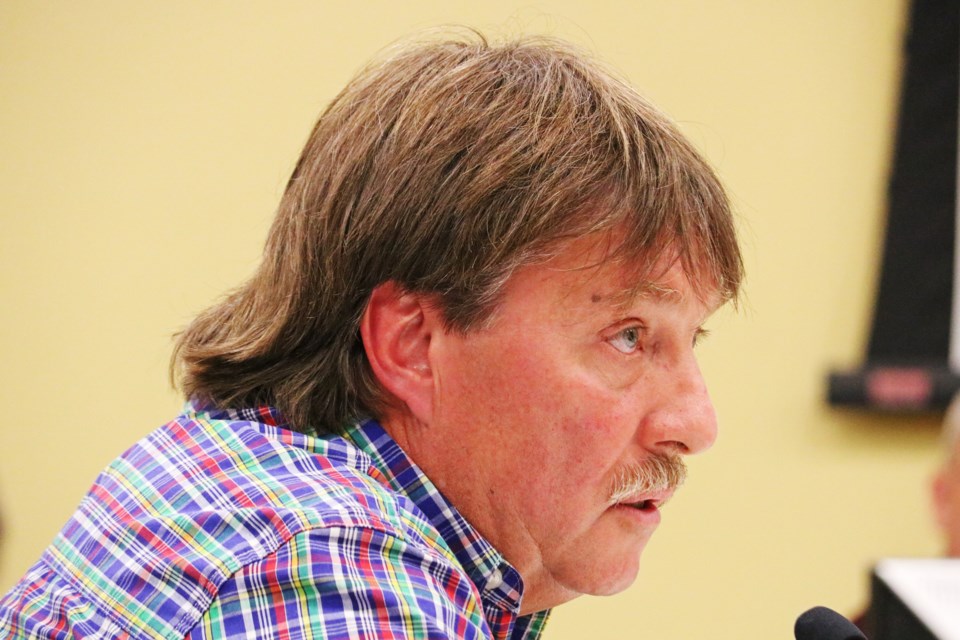 Lanney Dennis answers questions as part of a public meeting about a proposed cemetery at 3369 Line 13, during the regular meeting of council at the Bradford West Gwillimbury Public Library, on Tuesday evening, Oct. 17.