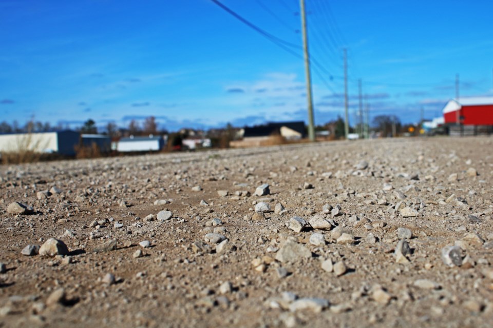 The gravel portion of Simcoe Road recommended for resurfacing is seen looking north towards Canal Road on Nov. 14.