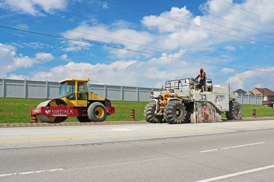 Crews work on the north side of Line 8 west of Langford Boulevard as part of Bradford’s project to resurface and reinforce Line 8 between County Road 4 (Yonge Street) and Sideroad 10, as well as Sideroad 10 between Line 8 and Reagens Industrial Parkway on Tuesday, May 21.