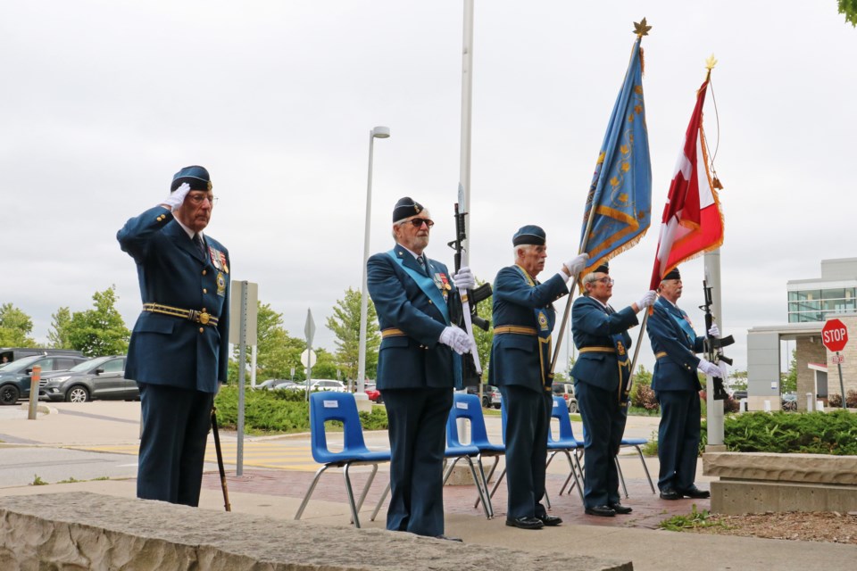 A colour party stands at attention during a flag raising to mark the beginning of celebrations for the Royal Canadian Air Force’s 100th anniversary at the Sunshine Meeting Place outside the BWG Leisure Centre in Bradford on Monday afternoon, June 10.