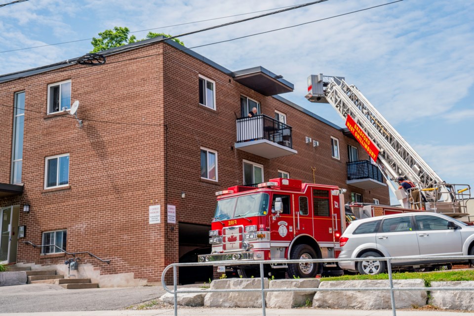 An apartment building was temporarily evacuated following a cooking-related fire in Bradford Wednesday afternoon.