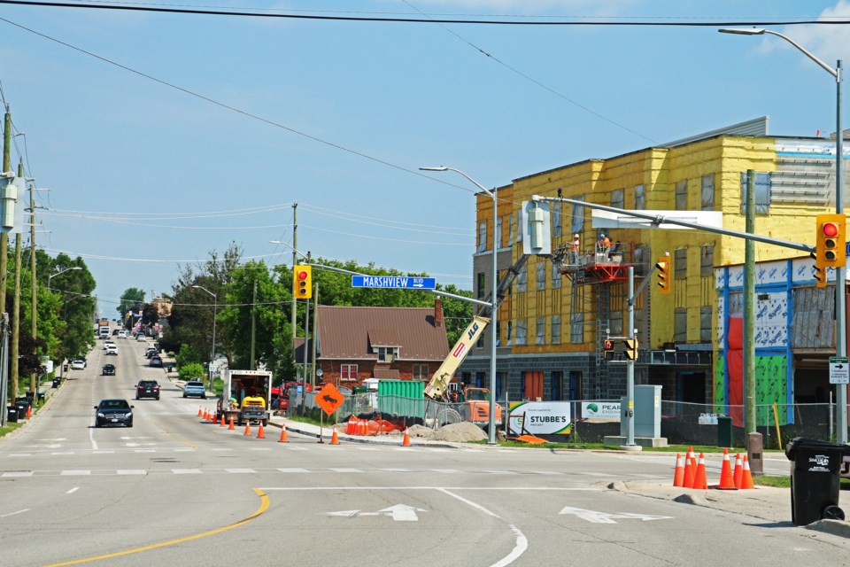 Council agreed to defer plans to resurface Simcoe Road, left, in Bradford this year, partially because work is still underway on the County of Simcoe’s affordable housing development, right, at the corner with Marshview Boulevard, as seen on June 20.