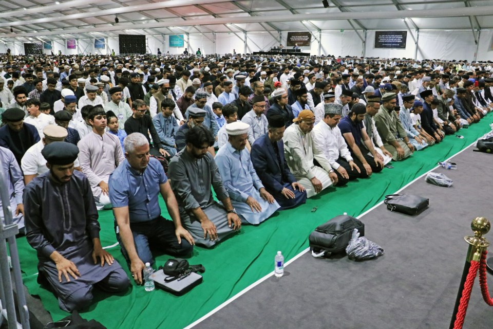 Hundreds pray during the 46th annual Jalsa Salana conference at Hadiqa Ahmad 3078 Line 11 in Bradford on July 5, 2024.