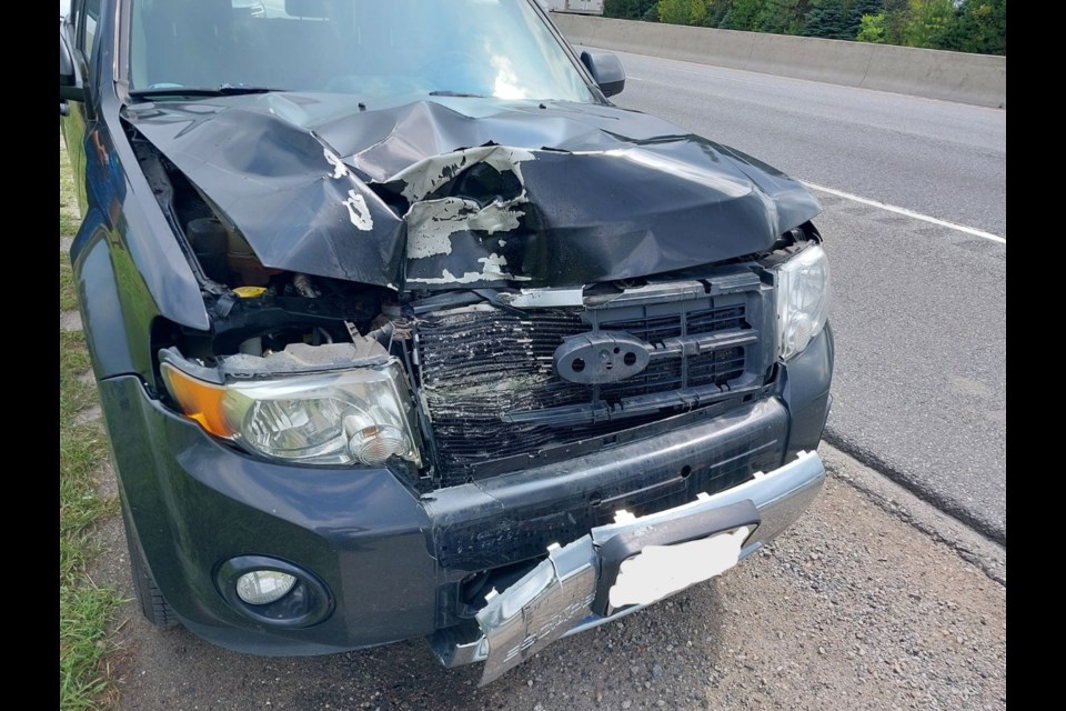 Damage shown after wheel parts came off a recently repaired vehicle near the interchange at highways 400 and 88 in Bradford July 25. 