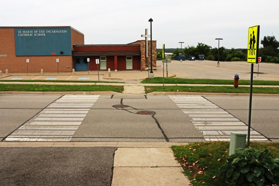 The crosswalk on Colborne Street near St. Marie of the Incarnation Catholic School is set for upgrades from the current configuration seen on Tuesday, Aug. 6, 2024.