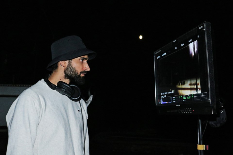 Scott Cavalheiro watches the monitor while he directs filming of Plan C at the Sun Simcoe Marina just outside Bradford on Aug. 15.