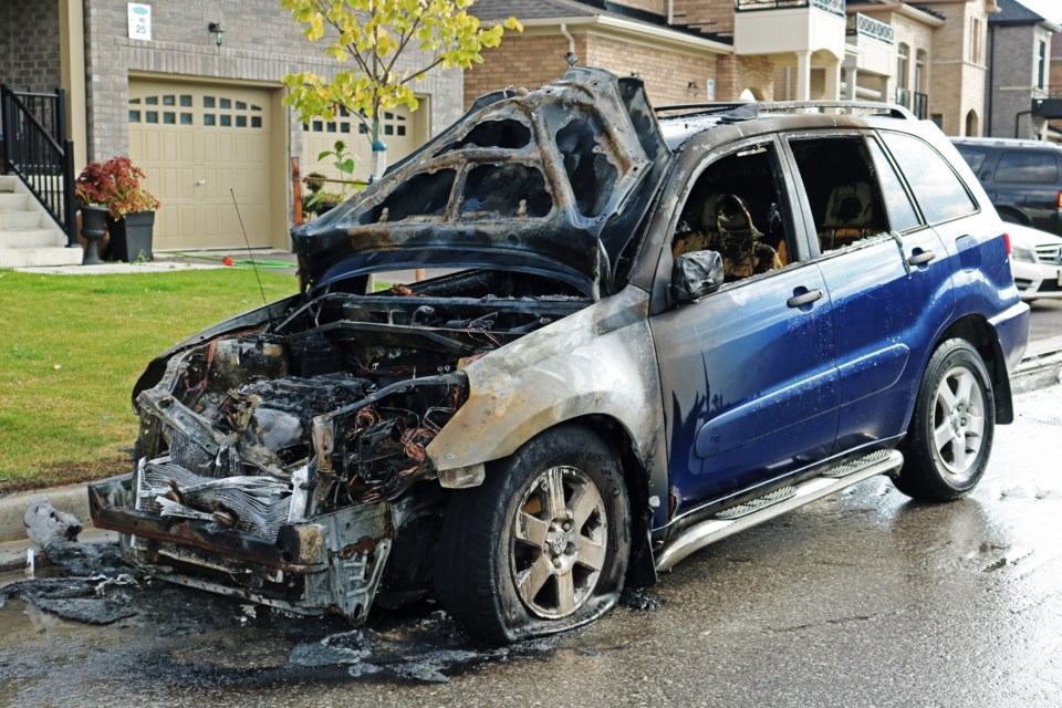 Members of Bradford West Gwillimbury Fire and Emergency Services extinguished a vehicle on fire parked on the street near 25 Mac Campbell Way in Bradford shortly before 5 p.m. on Sept. 25, 2024.