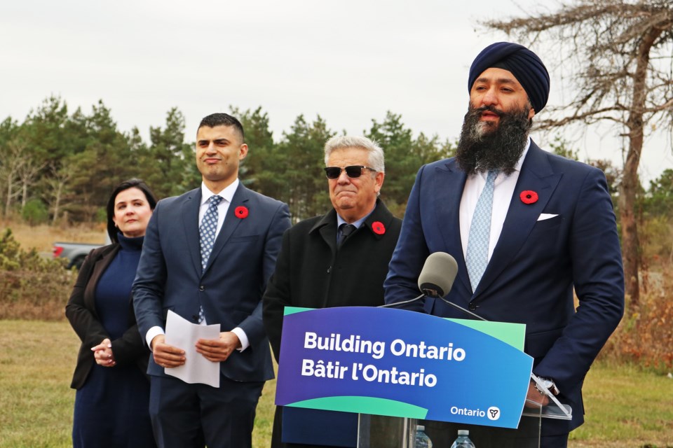 Minister of Transportation, Prabmeet Sarkaria, right, speaks during an announcement about the Bradford Bypass at Bradford’s administration centre on Line 11, on Oct. 28.