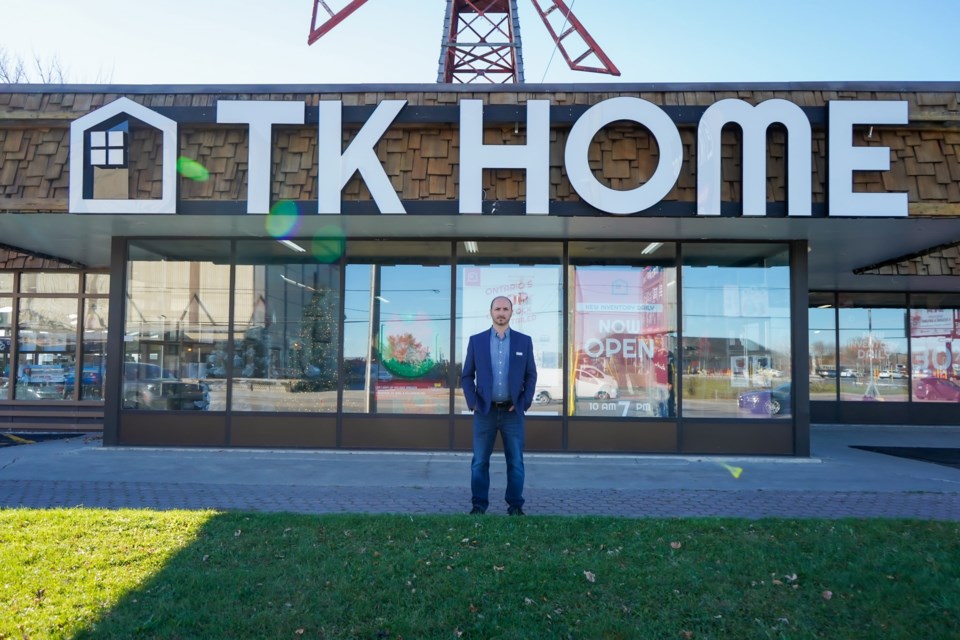 Owner Andrey Andreev is seen outside TK Home, during the grand opening at 44 Bridge St. in Bradford on Nov. 9.