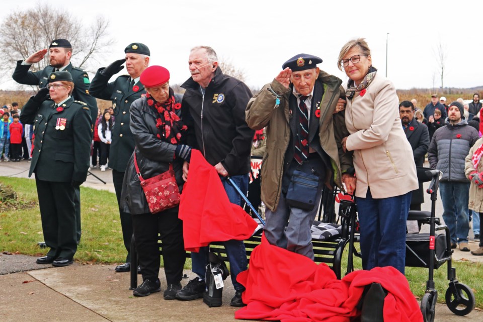 Brian Mallett (second from right) stands at attention during the Remembrance Day ceremony at the Bradford legion on Nov. 11, 2024.