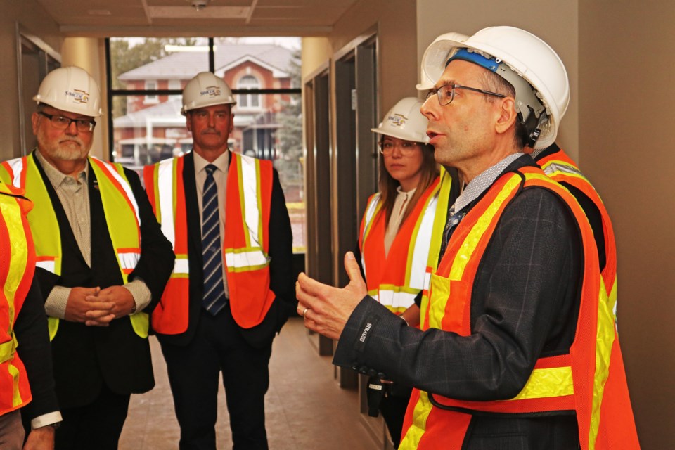 Brad Spiewak, director of social housing for the County Of Simcoe, right, guided a tour of the county’s nearly completed 50-unit affordable rental hub at 151 Simcoe Rd. in Bradford on Nov. 22.