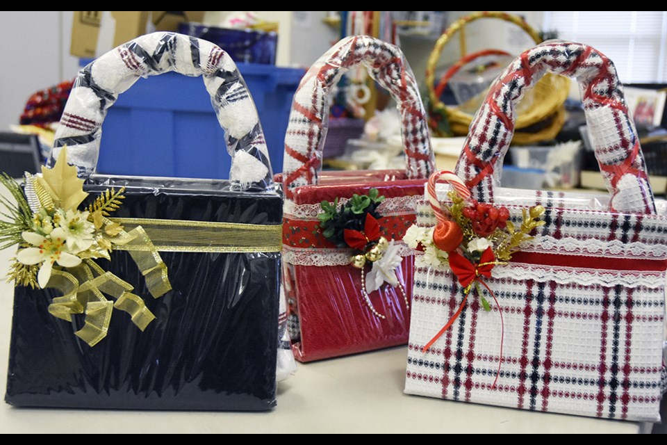 Clever craft by the ladies of the Danube Seniors Leisure Centre – a handbag made of tea towels. Makes a great hostess gift or wrapper for a gift card or certificate. Just one of the many crafts that will be available at Saturday’s sale. Miriam King/BradfordToday