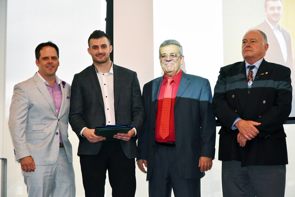 From left, BWG Councillor Peter Ferragine, Aspiring Entrepreneur Award-winner Cole Kirschner, BWG Deputy Mayor James Leduc, Simcoe County Warden George Cornell. Miriam King/Bradford Today