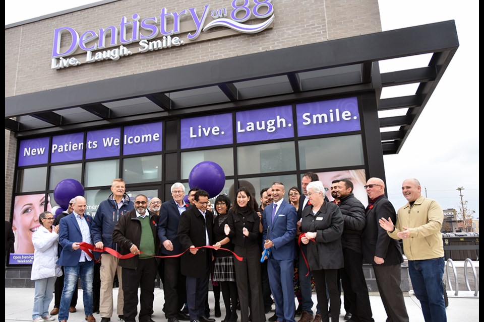 Ribbon-cutting at the Grand Opening of Dentistry on 88 dental clinic, Nov. 2. Miriam King/Bradford Today