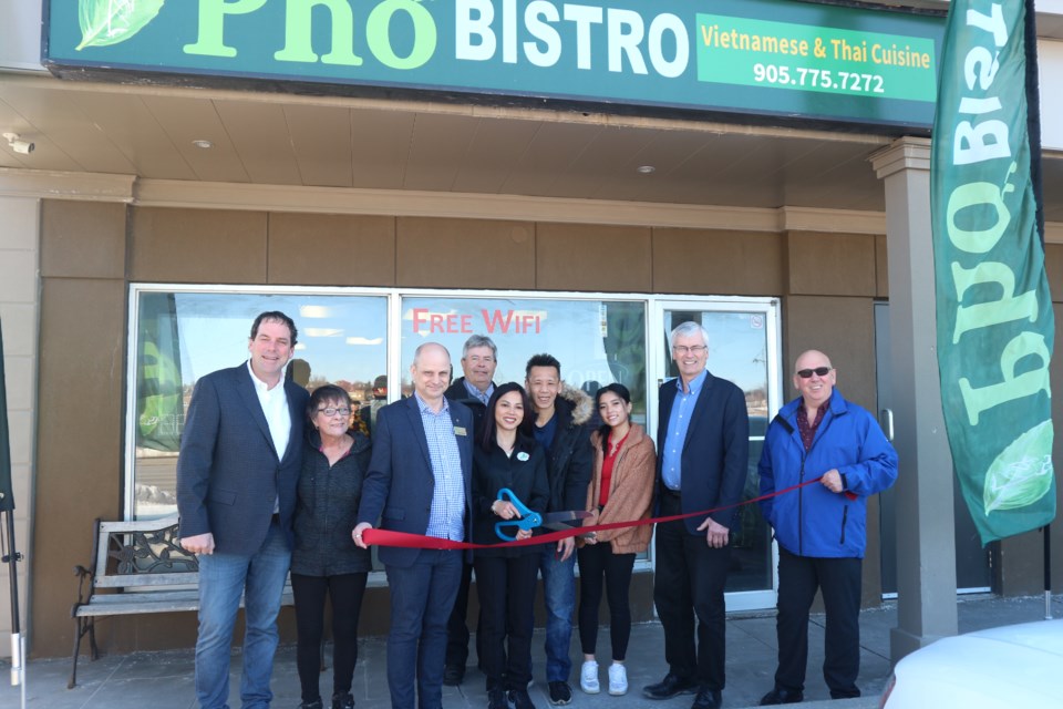 Hong Nguyen and Danny Dao surrounded by members of the Bradford community on their grand opening day. Natasha Philpott/BradfordToday                               