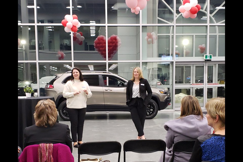 Organizers welcome a small but committed group to the inaugural meeting of 100 Women Who Care-South Simcoe. Photo supplied