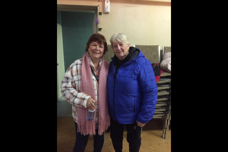 Residents from the apartment fire on Holland Street last year met at the Out of the Cold Cafe on Wednesday night for a get-together.