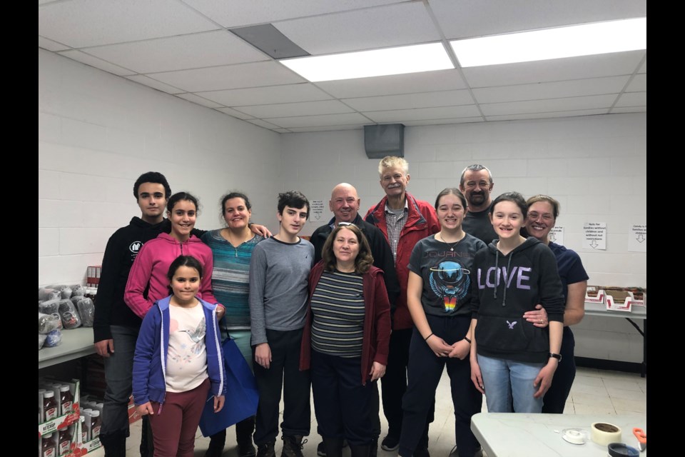 Emily and Sarah Dahlgreen with their team of volunteers on Sunday morning at the Lion's Park building. Natasha Philpott/BradfordToday