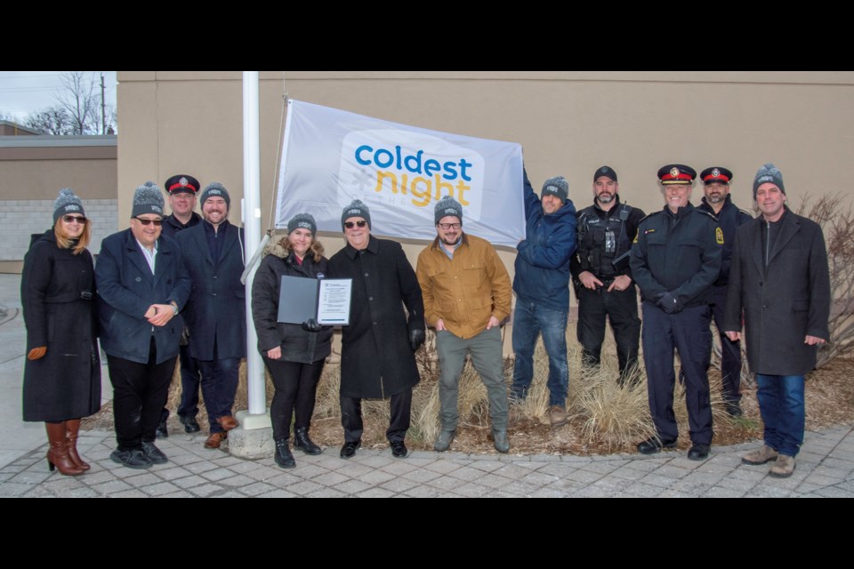 Coldest Night of the Year flag raising ceremony. Bradford walk takes place Saturday, Feb. 25, 2023. Paul Novosad for Bradford Today