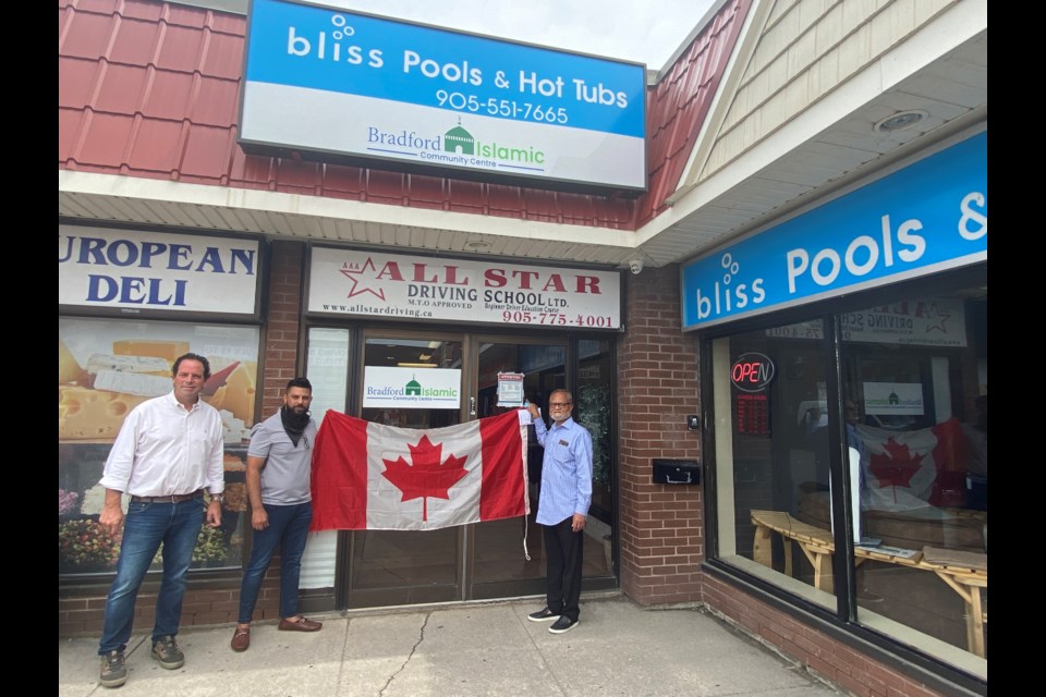 MP Scot Davidson stops by the Bradford Islamic Centre on Friday to check out the new signage out front, paid for by Davidson and made by local business Addictive Design.