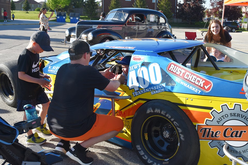 The Car Guy brought a collection of vehicles to Fieldcrest's Family Fun Fair - including a race car. Miriam King/Bradford Today