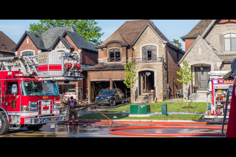 Bradford Fire clean up after an overnight house fire. Paul Novosad for Bradford Today.